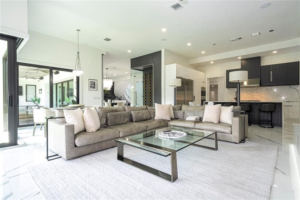 Dining room, Interior, Kitchen, Living room, Marble Walls, Pendant Lights, Recessed Lighting, Stainless Steel Appliances
