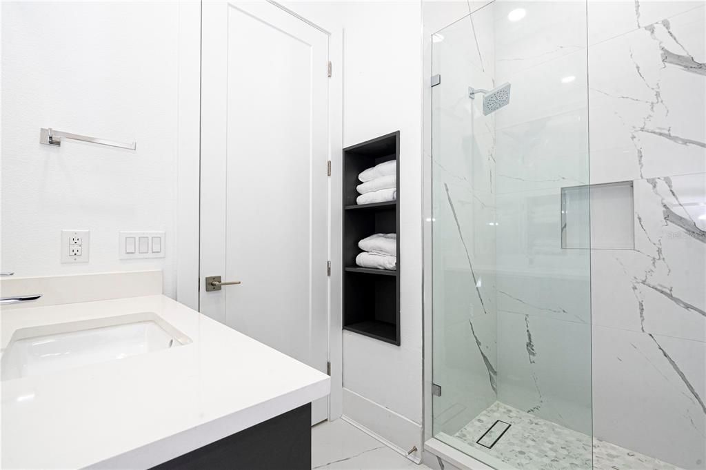 Bathroom, Glass Shower, Interior, Marble Walls, Recessed Lighting