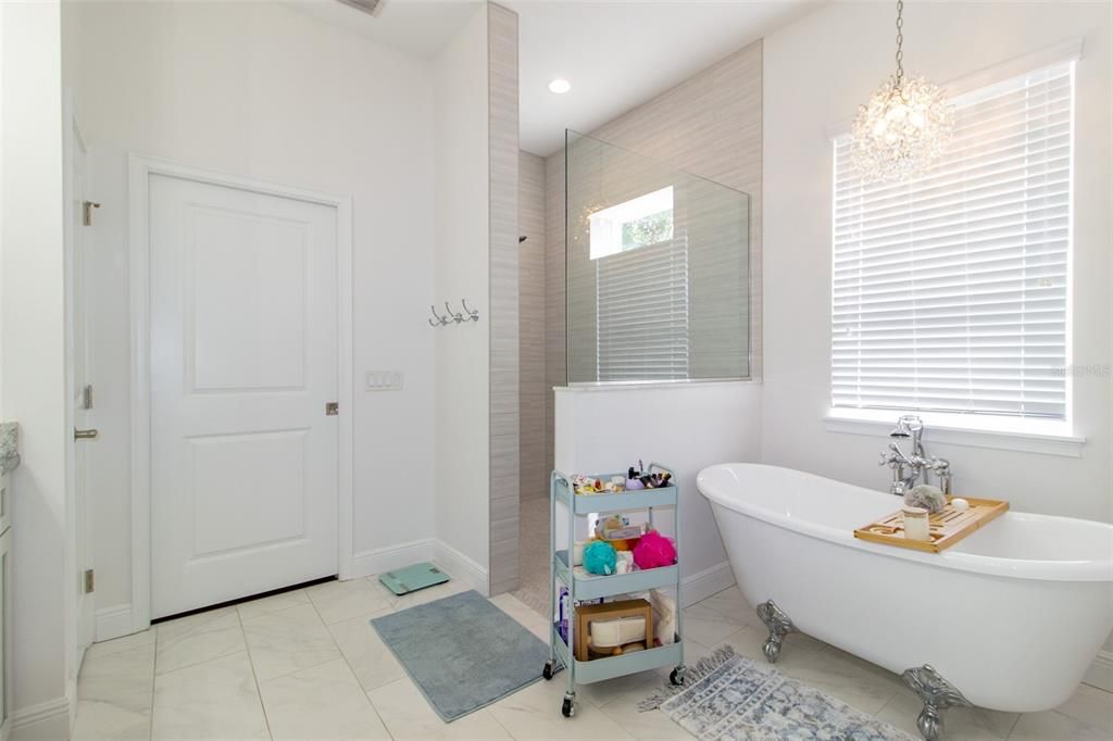 Bathroom, Chandelier, Free Standing Baths, Glass Shower, Interior, Recessed Lighting