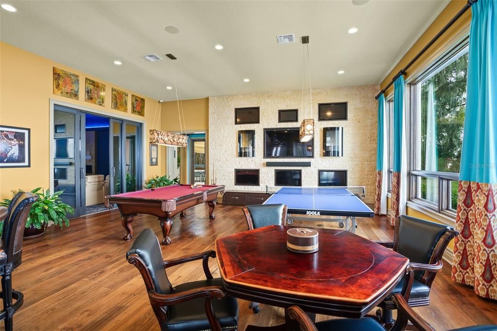 Billiard Table, Fireplace, Game Room, Interior, Pendant Lights, Recessed Lighting, Wood Texture Flooring