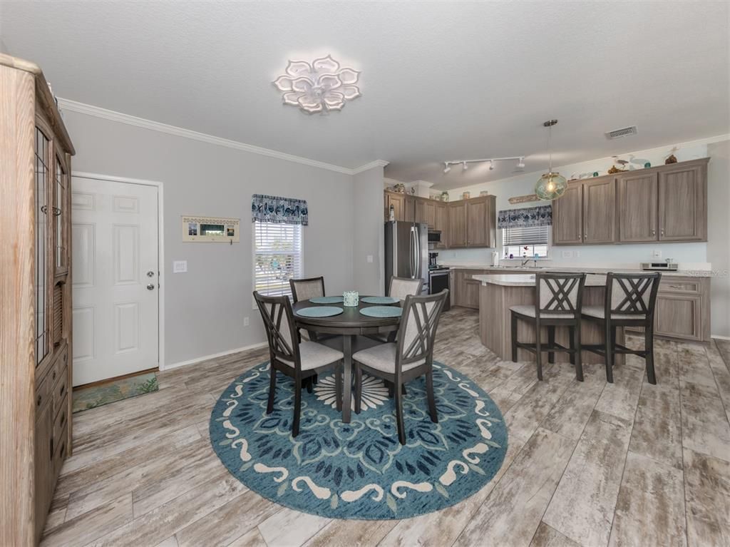 Dining room, Interior, Kitchen, Pendant Lights, Stainless Steel Appliances, Wood Texture Flooring