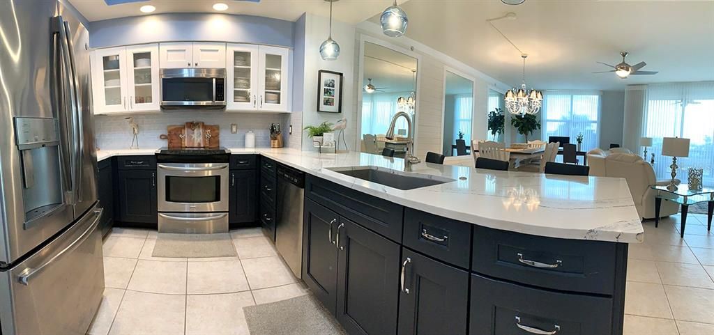 Chandelier, Dining room, Interior, Kitchen, Living room, Pendant Lights, Recessed Lighting, Stainless Steel Appliances