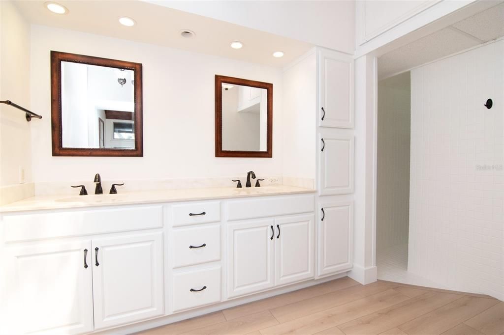 Bathroom, Dual Sink Vanities, Interior, Recessed Lighting, Wood Texture Flooring