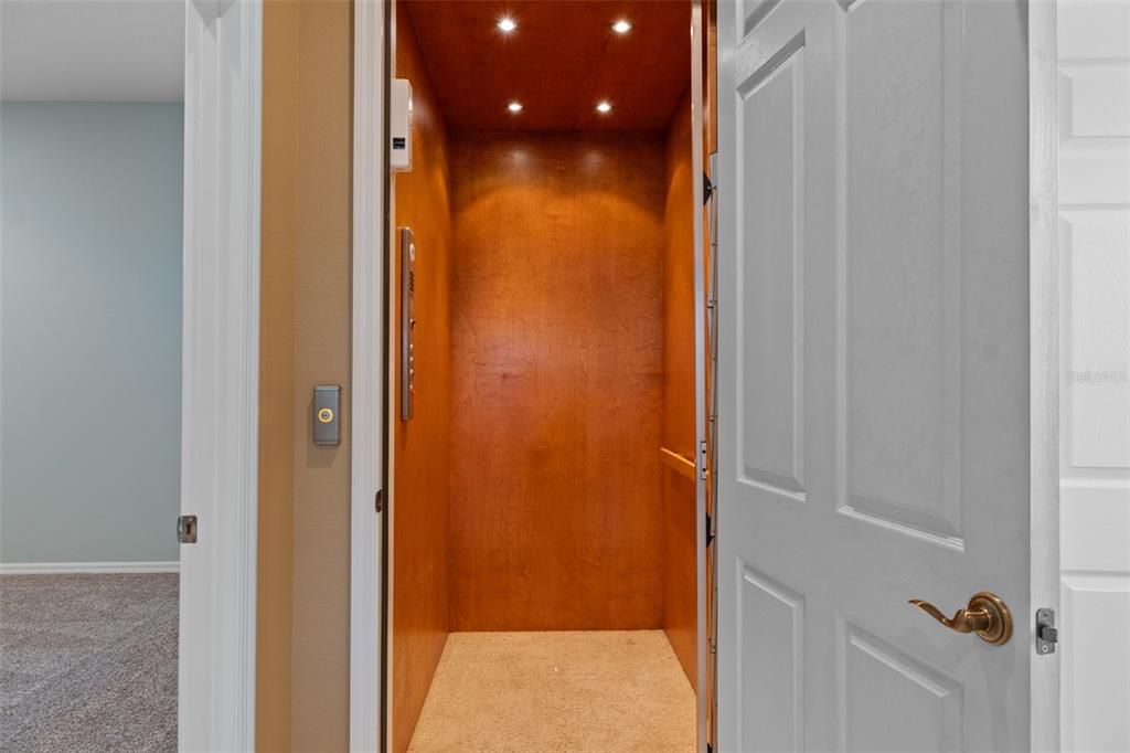 Elevator, Interior, Recessed Lighting, Wooden Ceilings, Wooden Walls