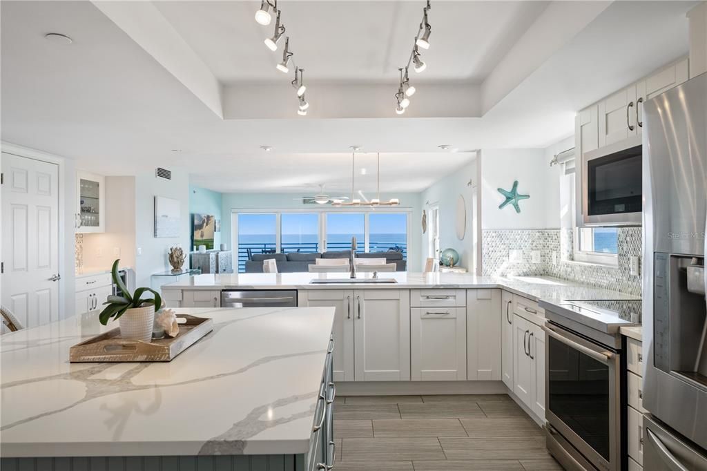 Dining room, Interior, Kitchen, Pendant Lights, Stainless Steel Appliances, Water, Wood Texture Flooring