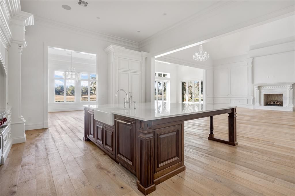 Chandelier, Fireplace, Interior, Kitchen, Pendant Lights, Recessed Lighting, Wood Texture Flooring