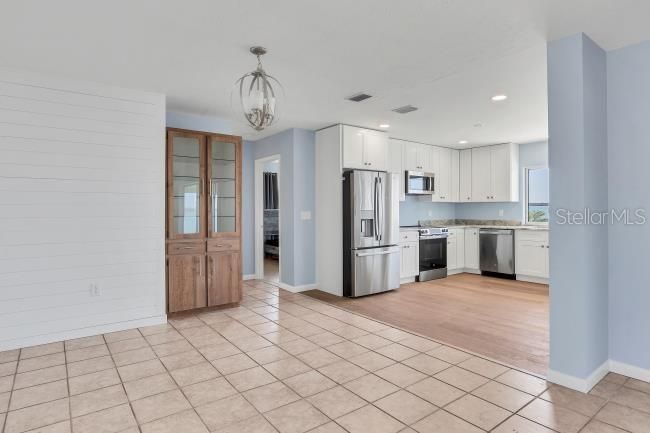 Chandelier, Interior, Kitchen, Recessed Lighting, Stainless Steel Appliances, Wood Texture Flooring