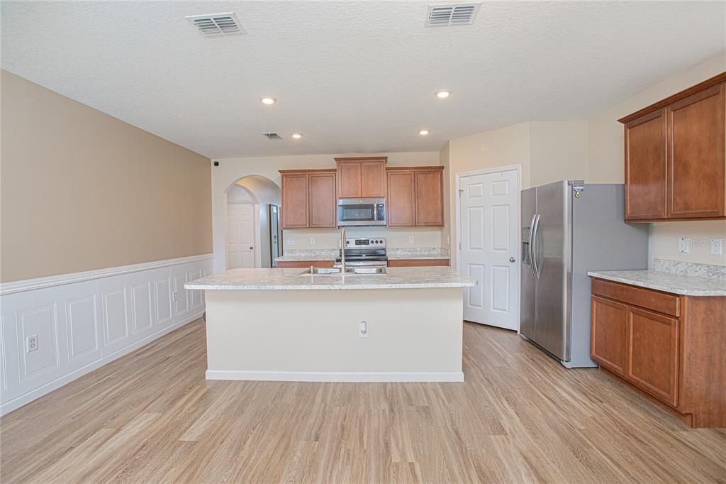 Interior, Kitchen, Recessed Lighting, Stainless Steel Appliances, Wood Texture Flooring