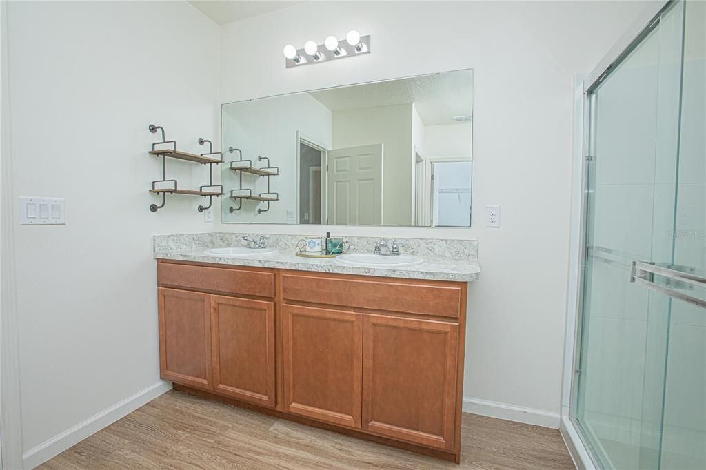 Bathroom, Dual Sink Vanities, Glass Shower, Interior, Wood Texture Flooring