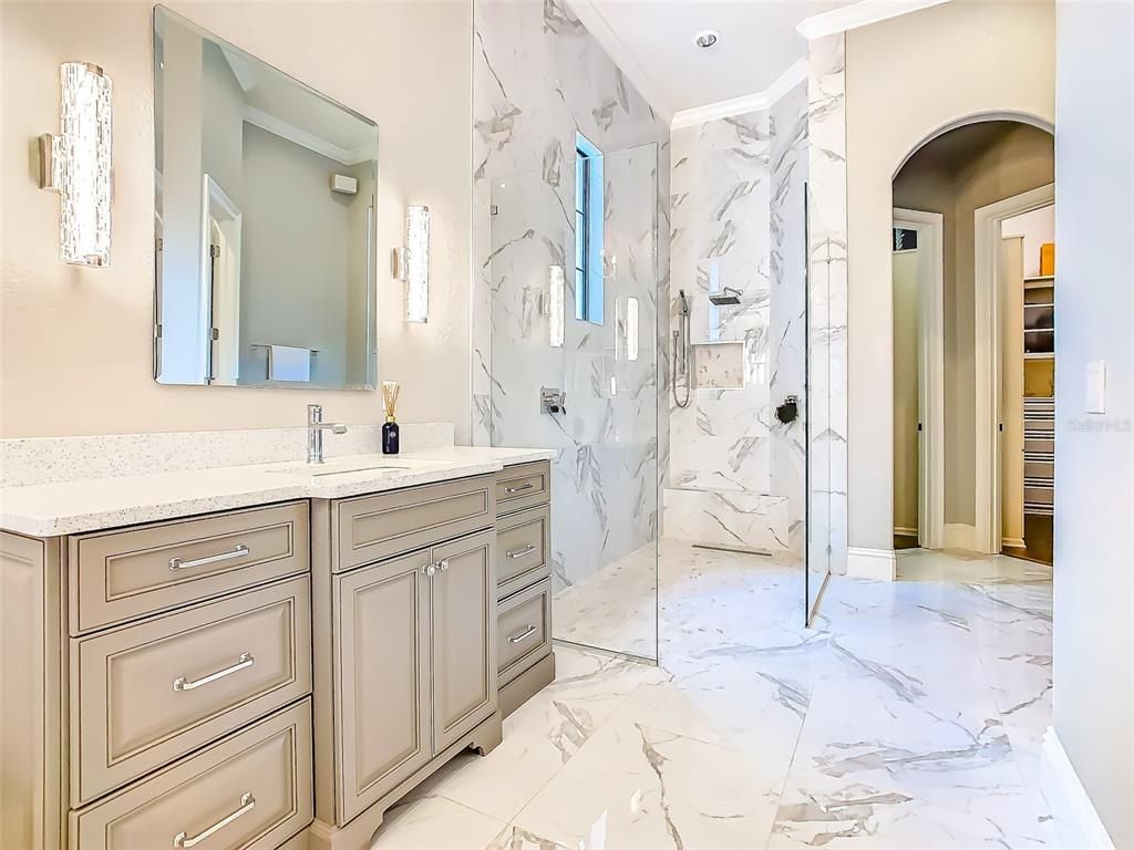 Bathroom, Dual Sink Vanities, Glass Shower, Interior, Marble, Marble Walls, Recessed Lighting