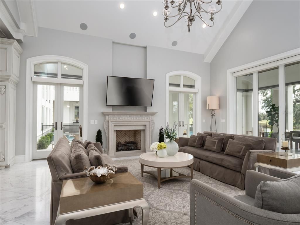 Chandelier, Fireplace, Interior, Living room, Marble, Recessed Lighting