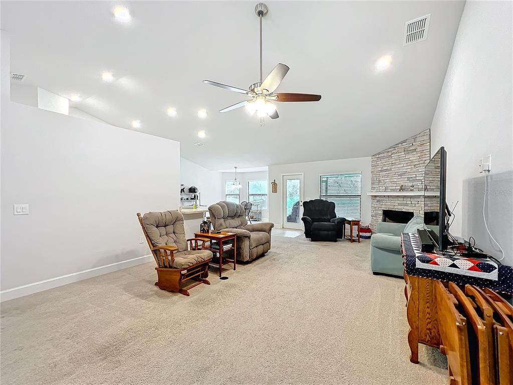 Fireplace, Interior, Living room, Pendant Lights, Recessed Lighting, Stone Walls