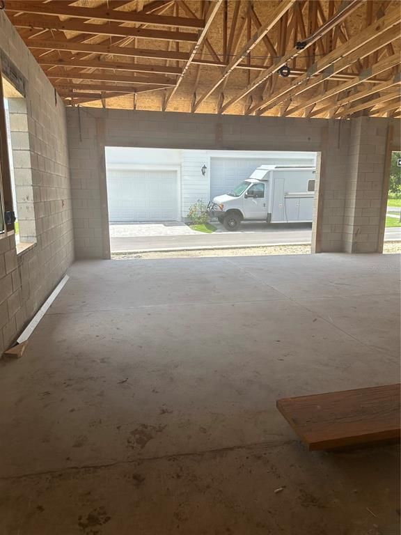 Garage, Interior, Stone Walls, Wooden Beams