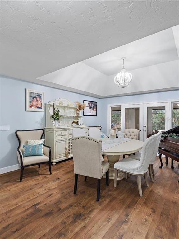 Chandelier, Dining room, Interior, Piano, Wood Texture Flooring
