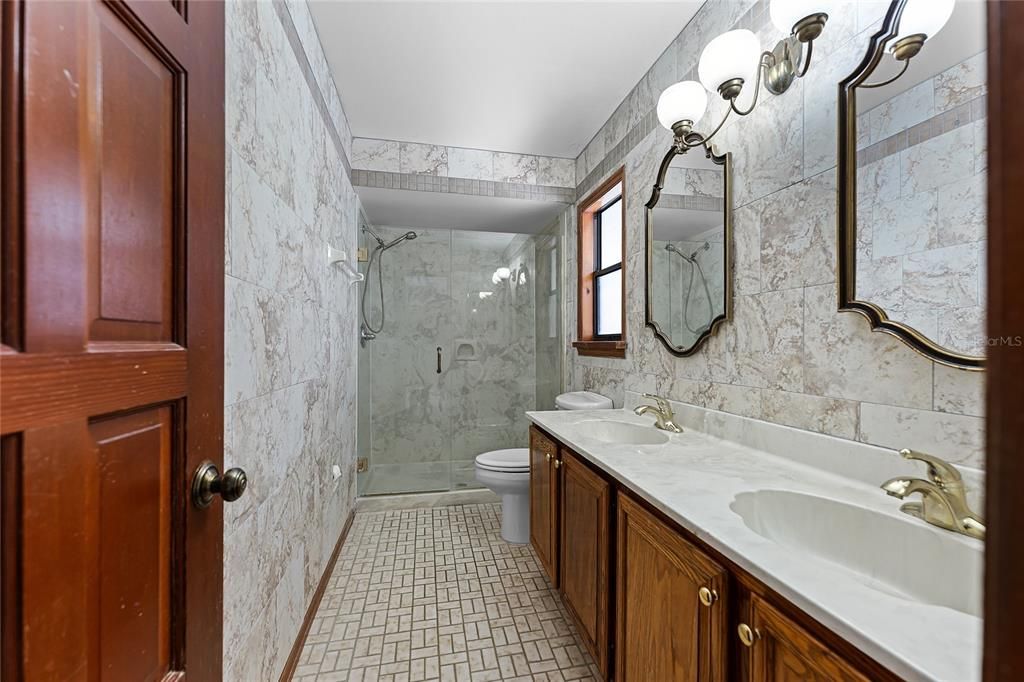 Bathroom, Dual Sink Vanities, Glass Shower, Interior, Marble Walls