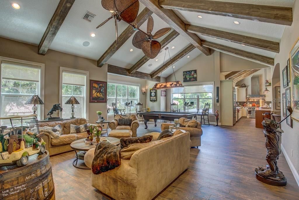 Billiard Table, Game Room, Interior, Living room, Pendant Lights, Recessed Lighting, Wooden Beams, Wood Texture Flooring