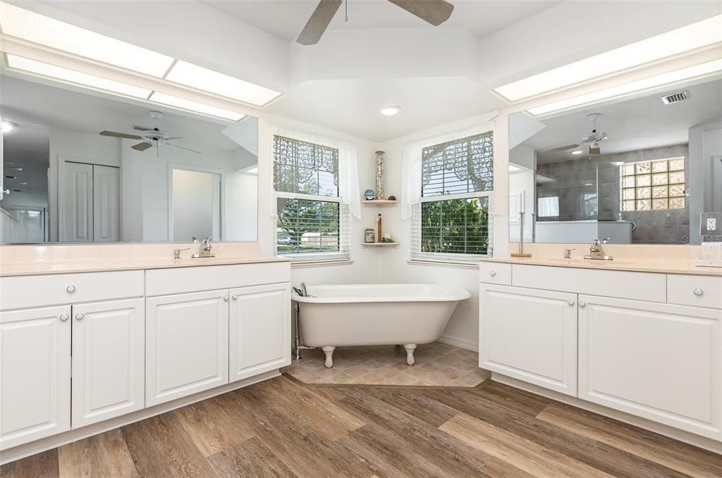 Bathroom, Dual Sink Vanities, Free Standing Baths, Glass Shower, Interior, Recessed Lighting, Wood Texture Flooring