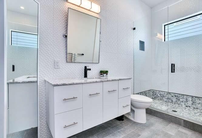 Bathroom, Dual Sink Vanities, Glass Shower, Interior, Recessed Lighting