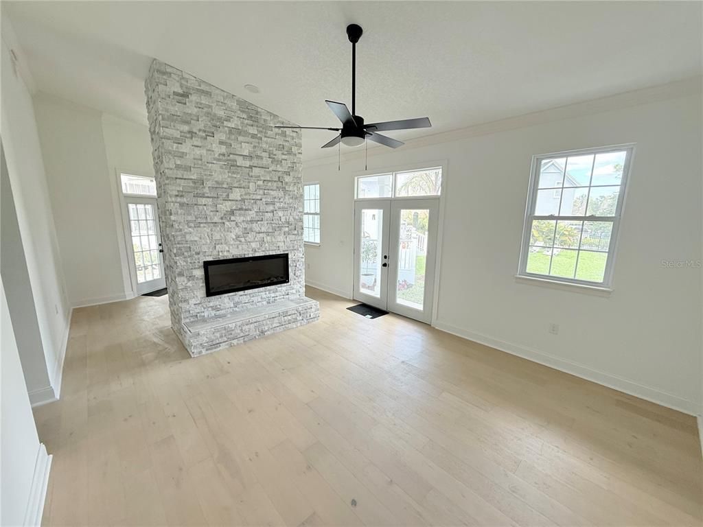 Empty room, Fireplace, Interior, Stone Walls, Wood Texture Flooring
