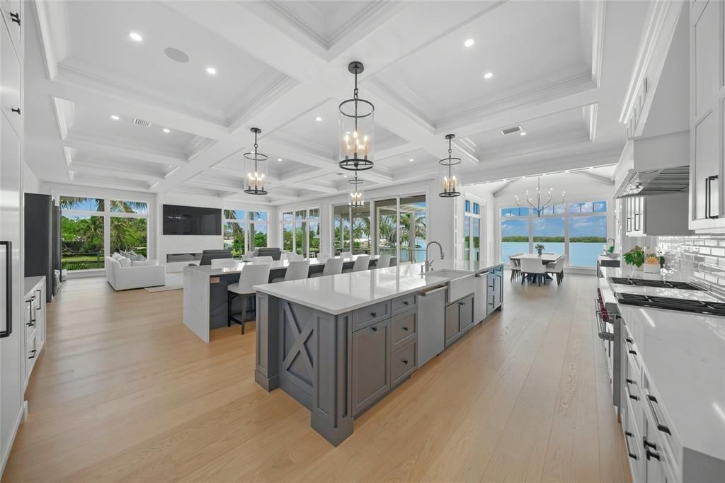 Chandelier, Dining room, Interior, Kitchen, Living room, Pendant Lights, Recessed Lighting, Water, Wood Texture Flooring