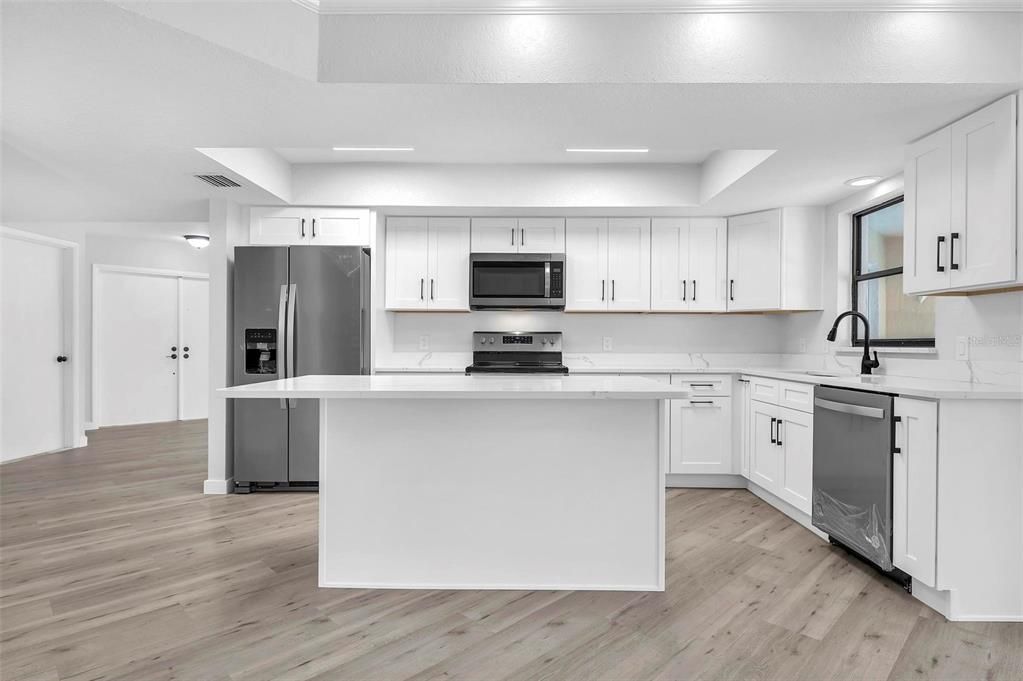 Interior, Kitchen, Recessed Lighting, Stainless Steel Appliances, Wood Texture Flooring