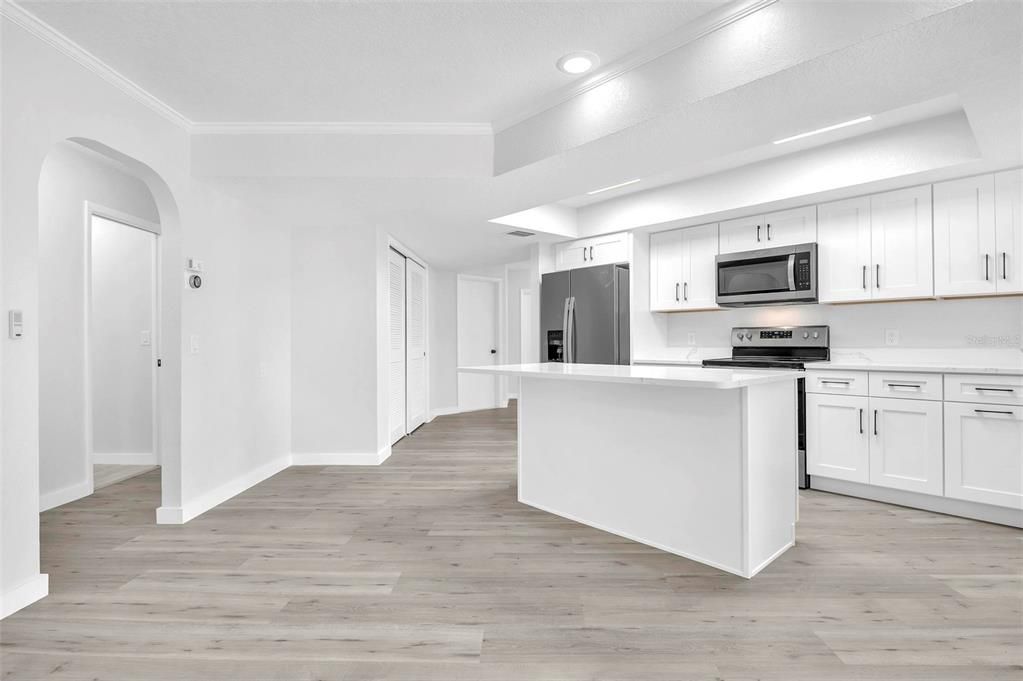 Interior, Kitchen, Recessed Lighting, Stainless Steel Appliances, Wood Texture Flooring