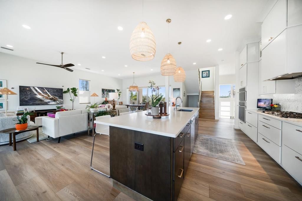 Dining room, Interior, Kitchen, Living room, Pendant Lights, Recessed Lighting, Wood Texture Flooring