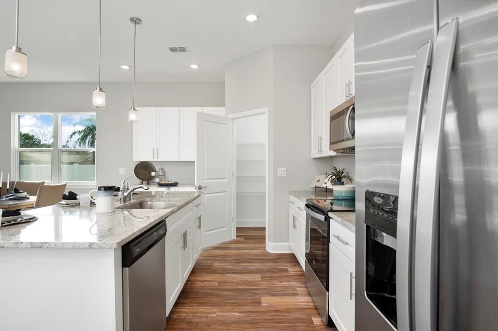 Interior, Kitchen, Pendant Lights, Recessed Lighting, Stainless Steel Appliances, Wood Texture Flooring
