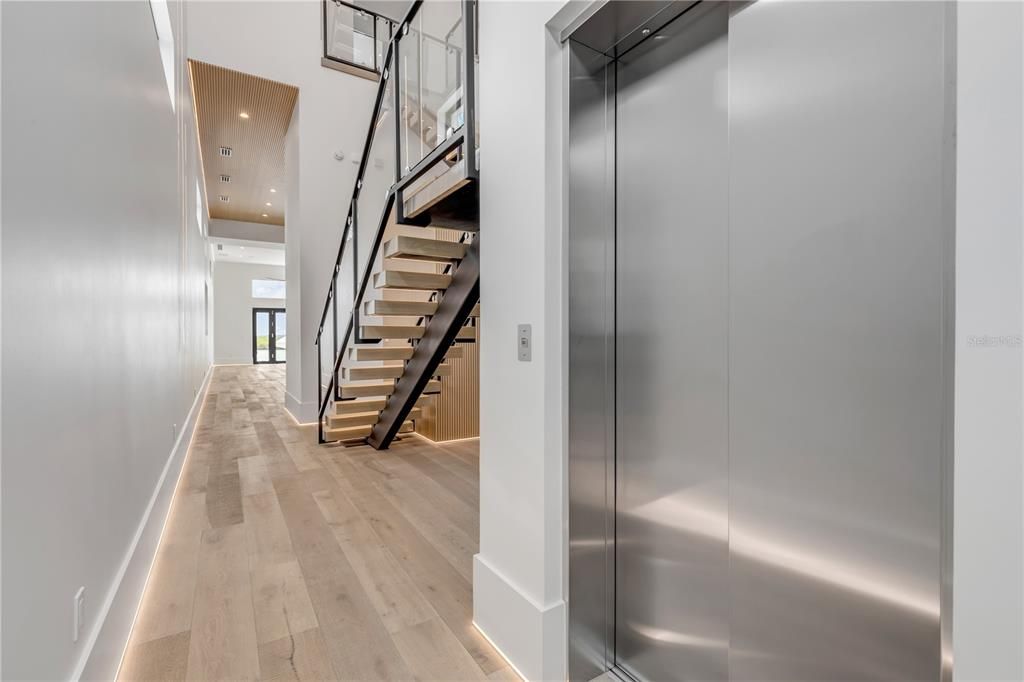 Elevator, Interior, Recessed Lighting, Wood Texture Flooring