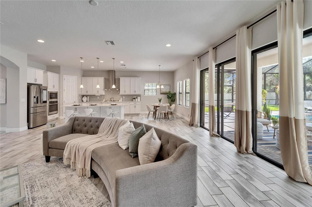 Dining room, Interior, Kitchen, Living room, Pendant Lights, Recessed Lighting, Stainless Steel Appliances, Wood Texture Flooring