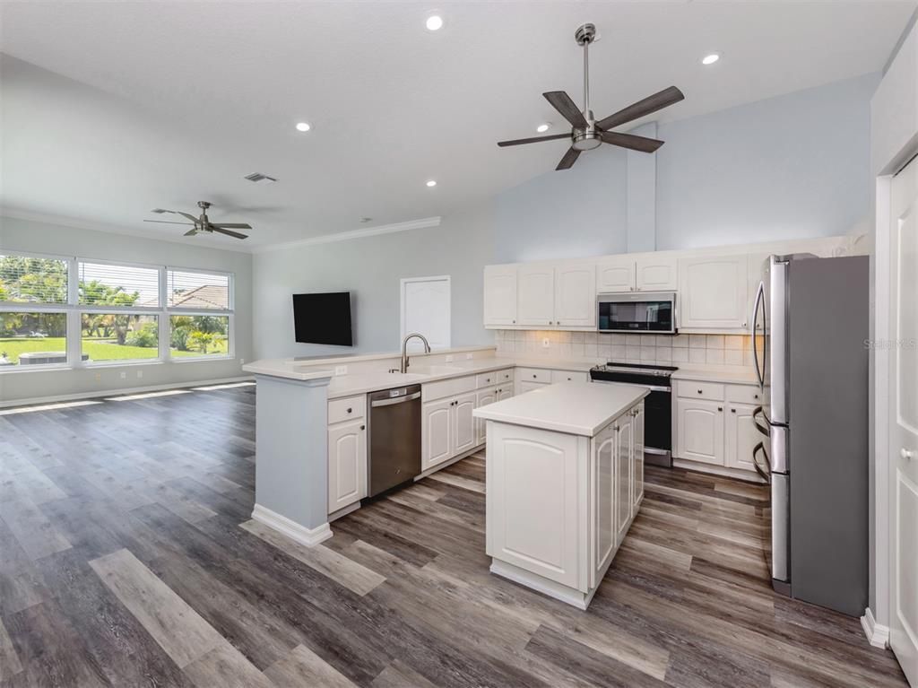 Interior, Kitchen, Recessed Lighting, Stainless Steel Appliances, Wood Texture Flooring
