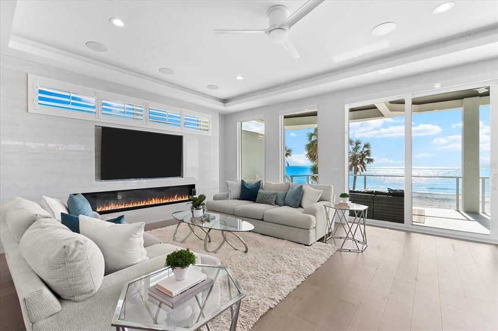Fireplace, Interior, Living room, Recessed Lighting, Water, Wood Texture Flooring