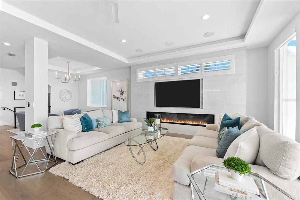 Chandelier, Fireplace, Interior, Living room, Pendant Lights, Recessed Lighting, Wood Texture Flooring
