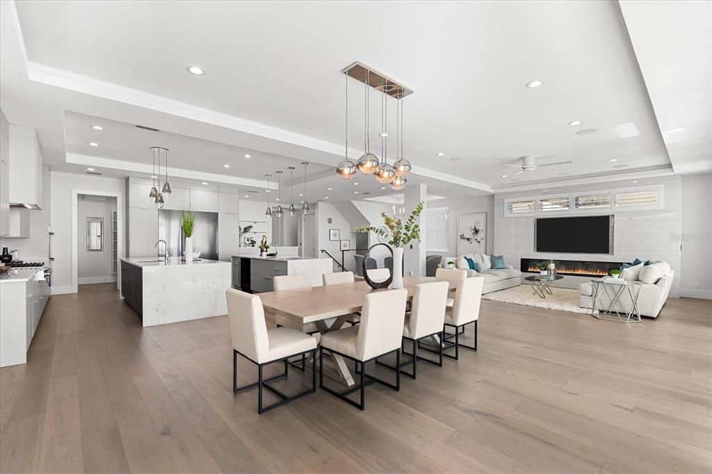 Dining room, Interior, Kitchen, Living room, Pendant Lights, Recessed Lighting, Stainless Steel Appliances, Wood Texture Flooring