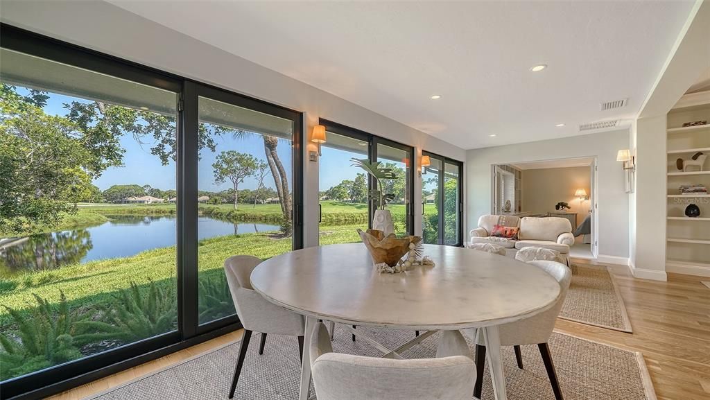 Dining room, Interior, Living room, Recessed Lighting, Water, Wood Texture Flooring