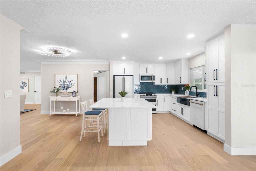 Dining room, Interior, Kitchen, Recessed Lighting, Stainless Steel Appliances, Wood Texture Flooring