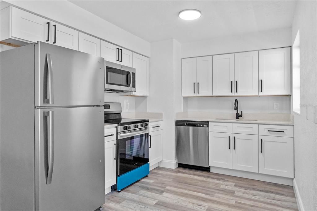 Interior, Kitchen, Recessed Lighting, Stainless Steel Appliances, Wood Texture Flooring