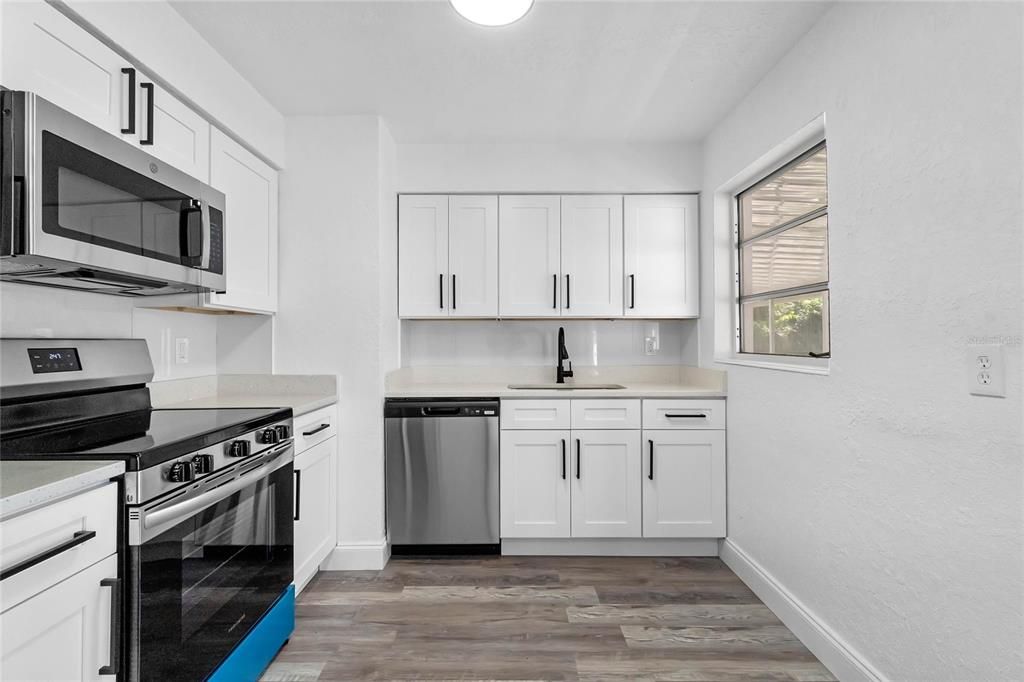 Interior, Kitchen, Recessed Lighting, Stainless Steel Appliances, Wood Texture Flooring