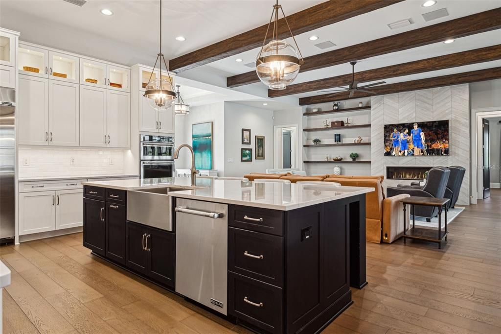 Fireplace, Interior, Kitchen, Pendant Lights, Recessed Lighting, Stainless Steel Appliances, Wooden Beams, Wood Texture Flooring