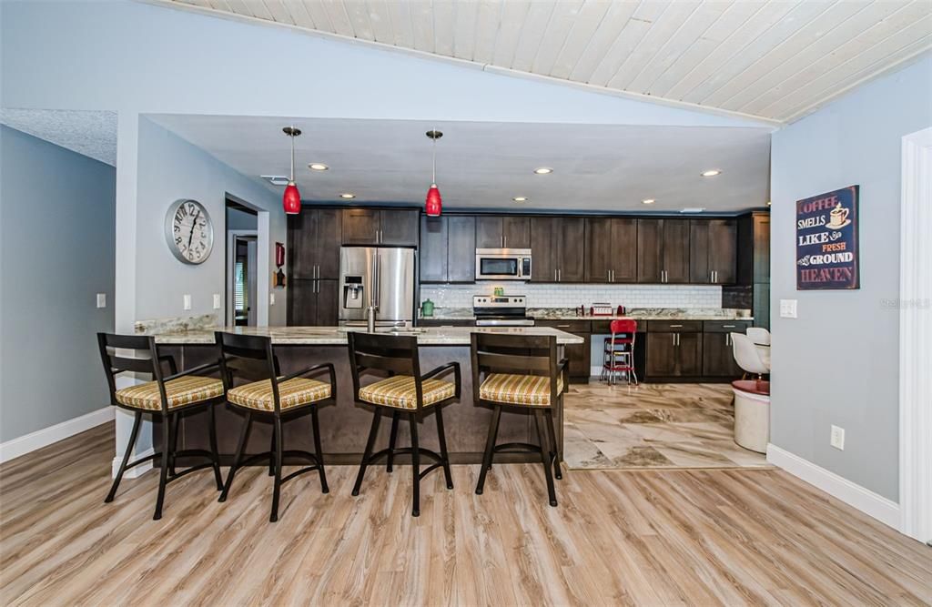 Interior, Kitchen, Marble, Pendant Lights, Recessed Lighting, Stainless Steel Appliances, Wood Texture Flooring
