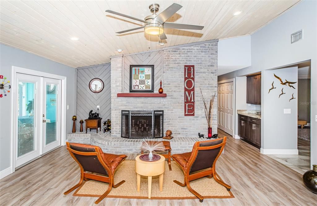 Fireplace, Interior, Recessed Lighting, Stone Walls, Wood Texture Flooring