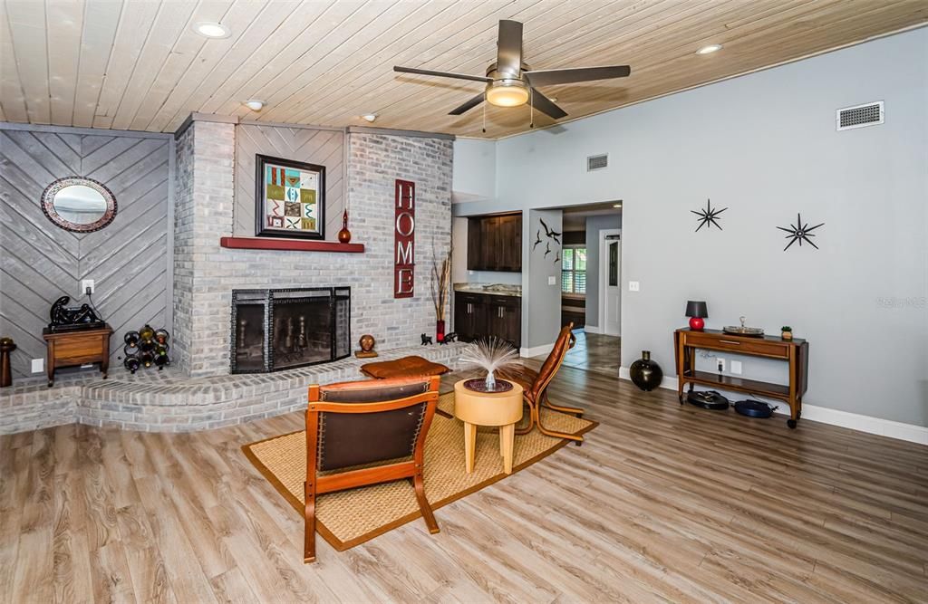 Fireplace, Interior, Recessed Lighting, Stone Walls, Wood Texture Flooring
