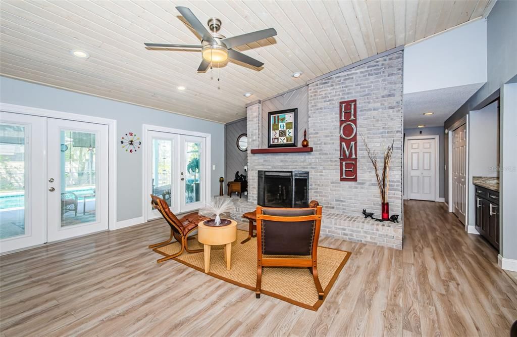 Fireplace, Interior, Recessed Lighting, Stone Walls, Wood Texture Flooring