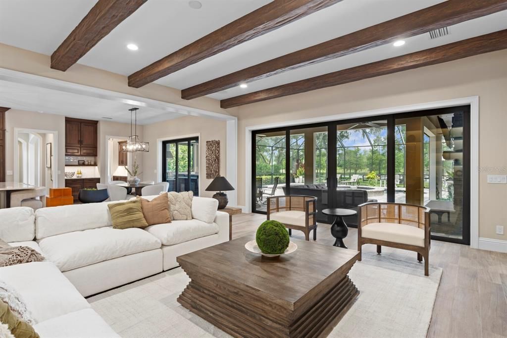 Dining room, Interior, Living room, Pendant Lights, Recessed Lighting, Wooden Beams, Wood Texture Flooring