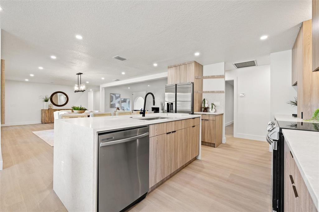 Chandelier, Dining room, Interior, Kitchen, Pendant Lights, Recessed Lighting, Stainless Steel Appliances, Wood Texture Flooring