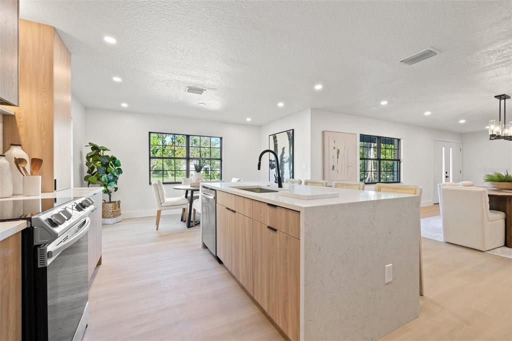 Chandelier, Dining room, Interior, Kitchen, Recessed Lighting, Stainless Steel Appliances, Wood Texture Flooring