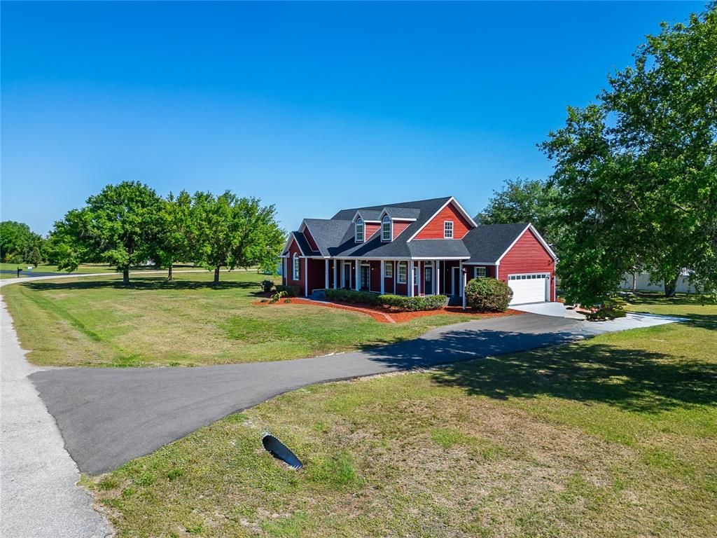 Attached, Backyard, Exterior, Facade, Brick Facade, Cape Cod