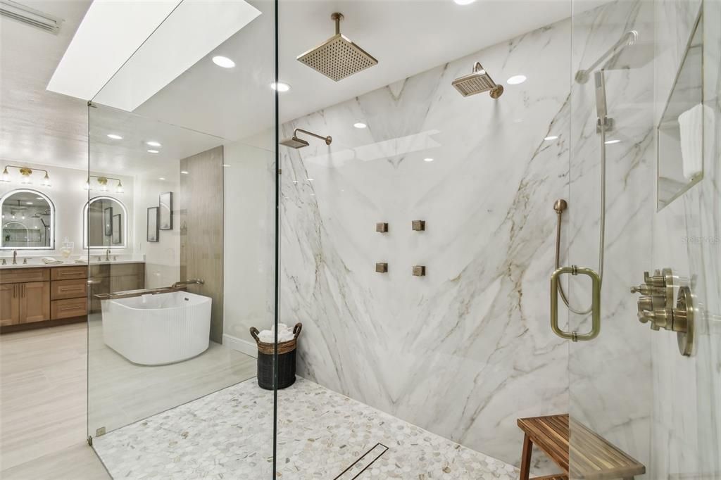 Bathroom, Dual Sink Vanities, Free Standing Baths, Glass Shower, Interior, Marble Walls, Recessed Lighting