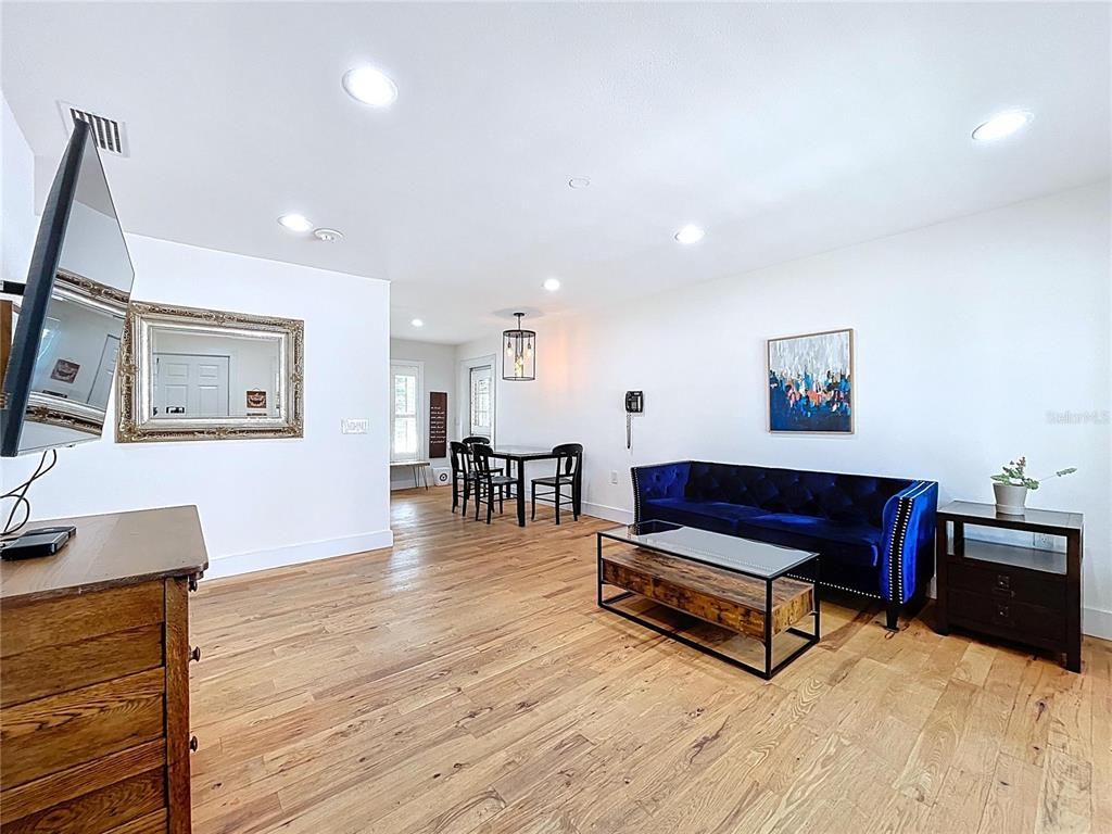 Dining room, Interior, Living room, Pendant Lights, Recessed Lighting, Wood Texture Flooring