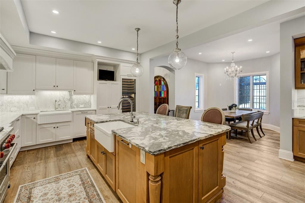 Chandelier, Dining room, Interior, Kitchen, Pendant Lights, Recessed Lighting, Stainless Steel Appliances, Wood Texture Flooring